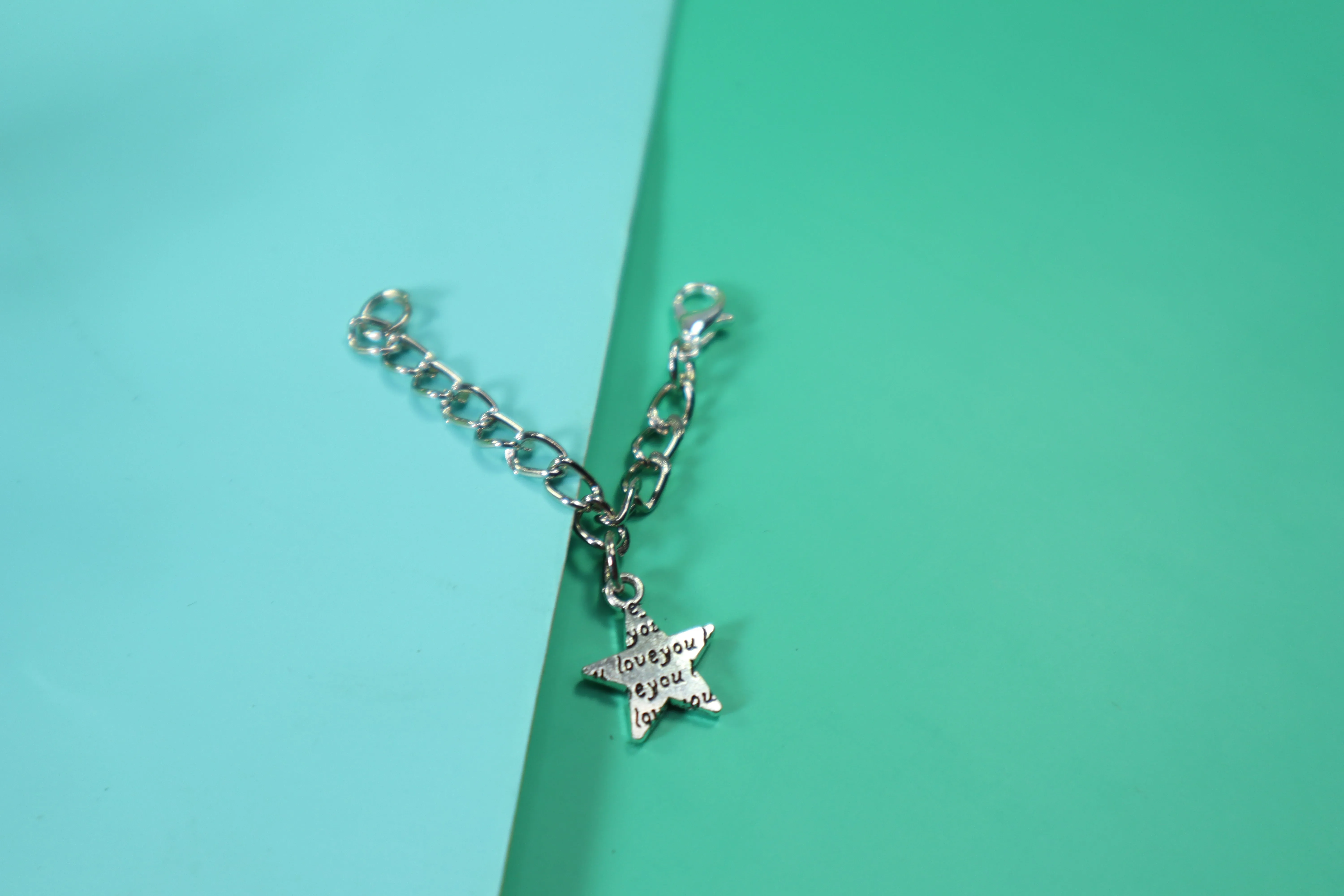 Kamule Silver Star Watch Charm